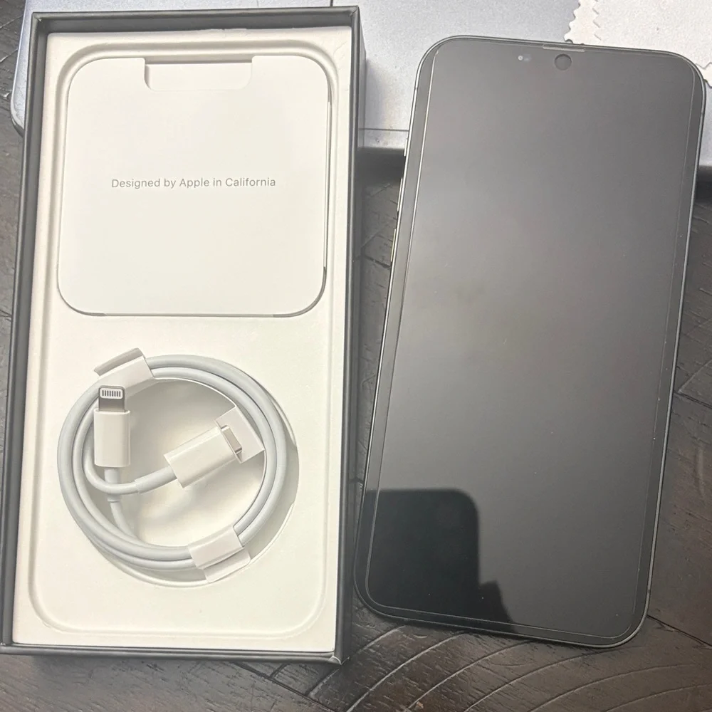 Apple Smartphone with White Charging Cable